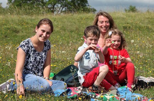 A family having a Picnic at Swyncombe Downs in the Chilterns AONB