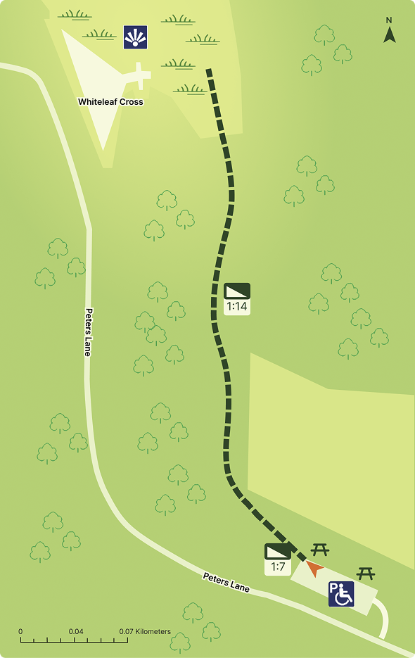 A simple map showing a woodland with a path and icons to show facilities.