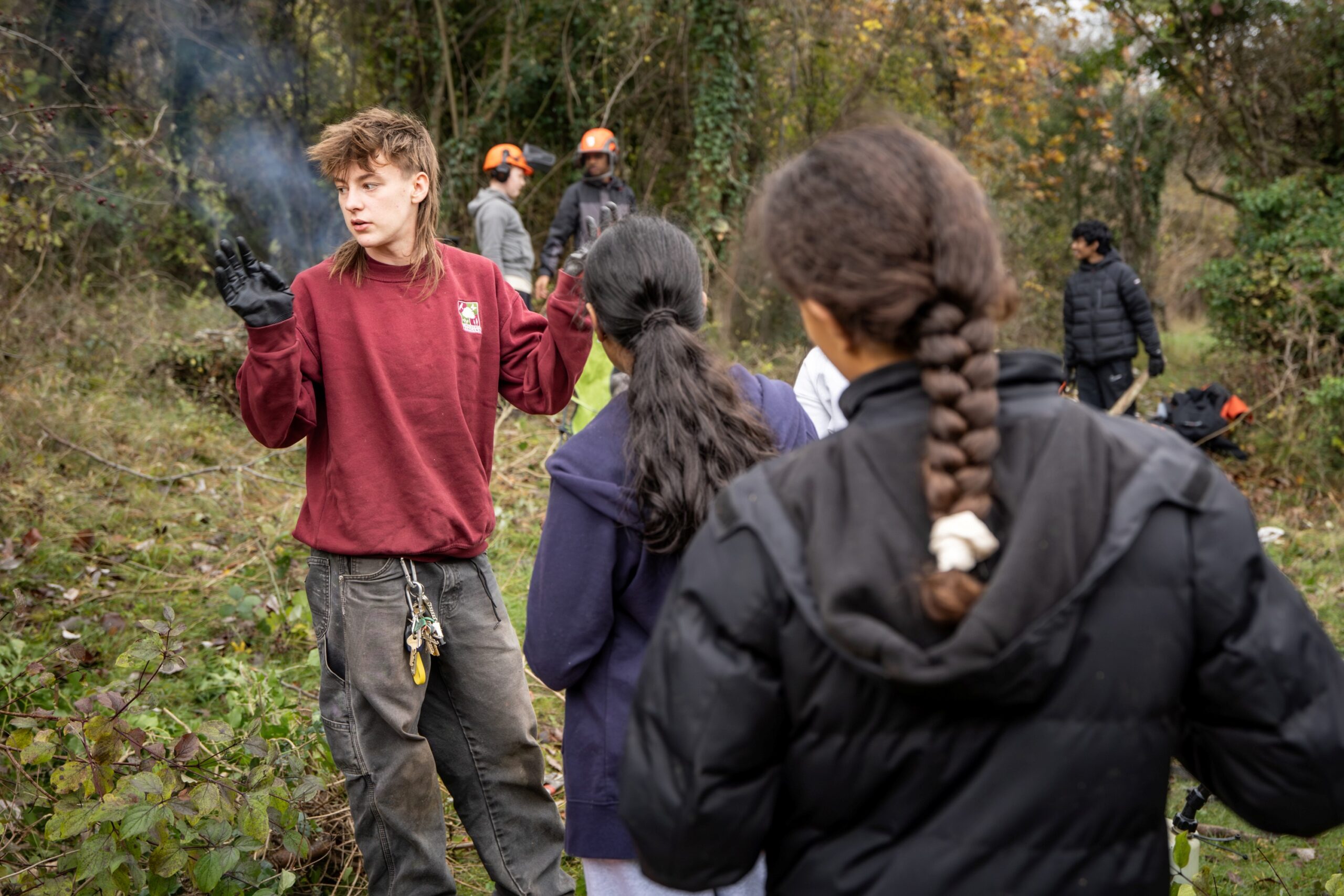 Young ranger leading a scrub bash in the Chilterns