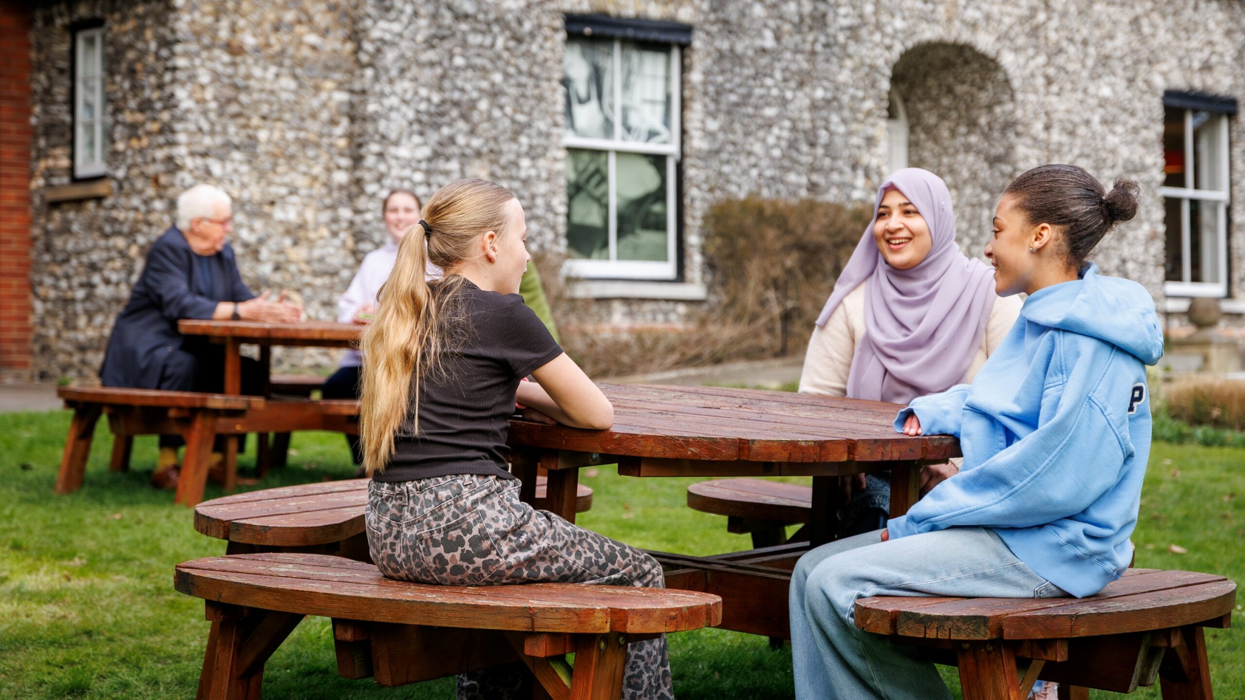 group of young people chatting with a volunteer at Wycombe Museum
