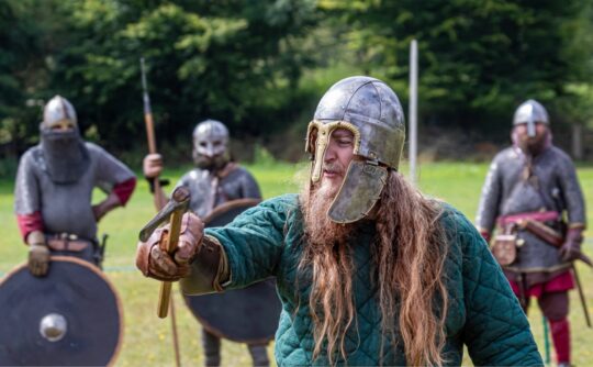 Viking in costume in battle re-enactment